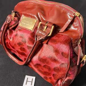 Elegant Innue Burgundy Animal Print Satchel